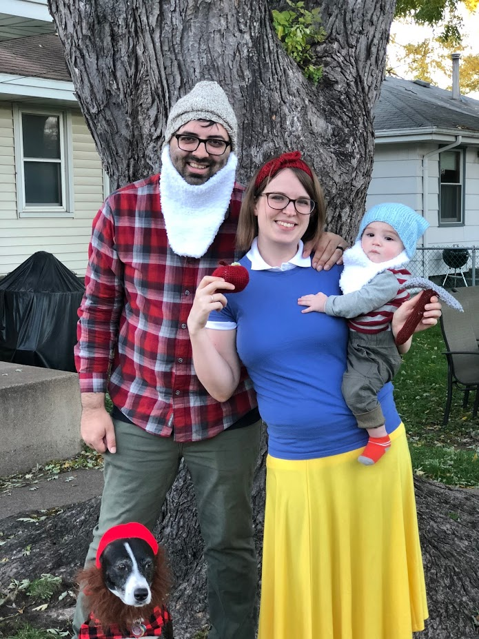 photo (from left to right): Dog in lumberjack costume, Kamran in dwarf costume, Cassie in Snow White costume, and baby Rami in dwarf costume